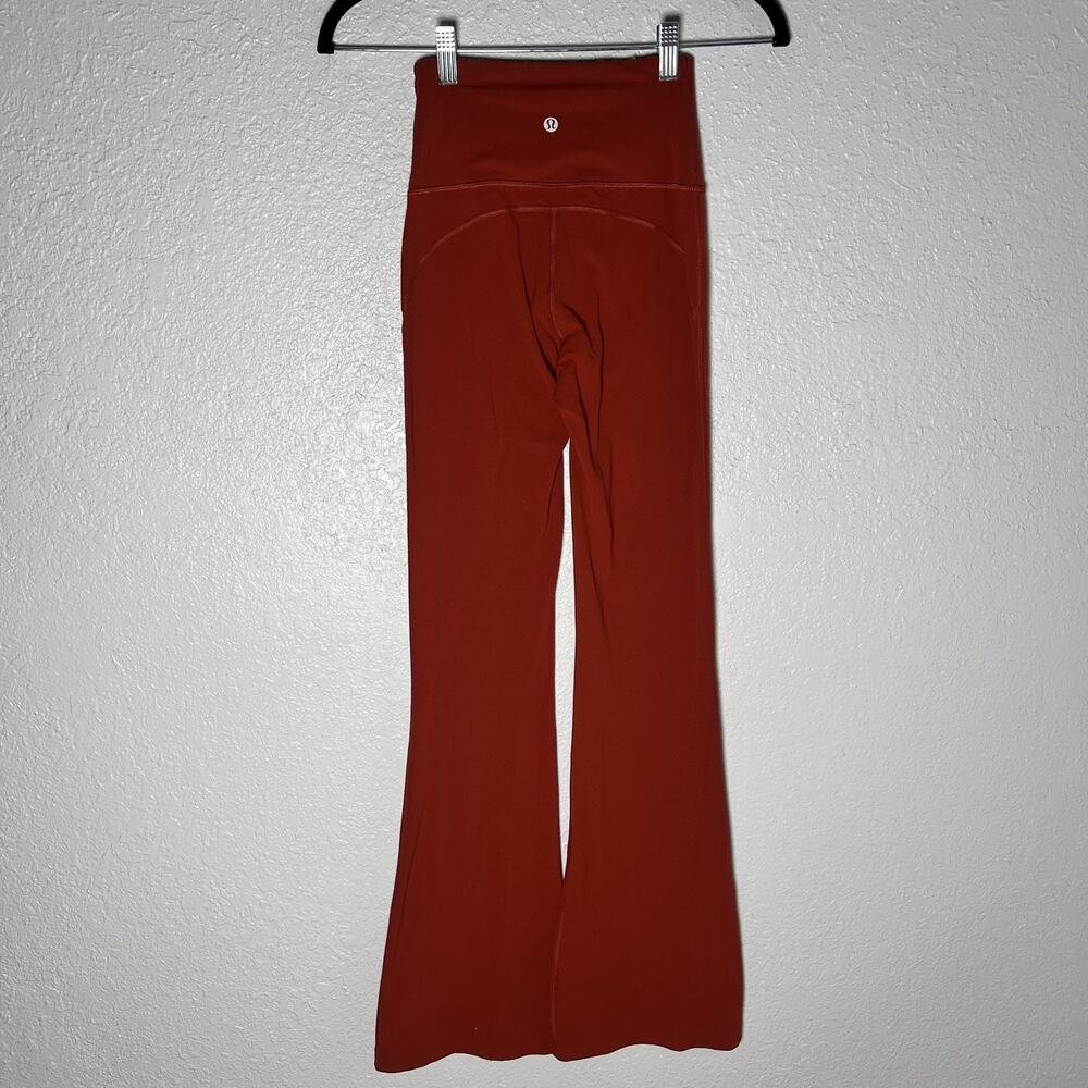 lululemon athletica High-Rise Flared Leggings in Rust/Cayenne - Picture 2 of 5